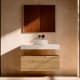Meuble de salle de bains avec plan de toilette en HPL résine de 10 cm, finition en marbre « Cala », avec caisson « Nomade » de Visobath principal 1